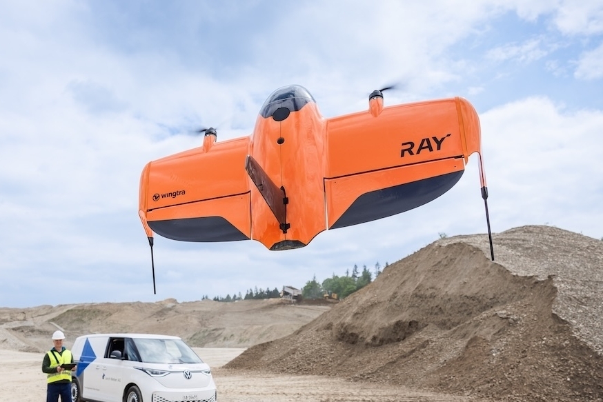 Wingtraray drone flying with operator quarry 1